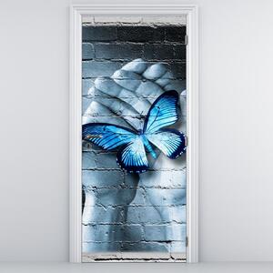 Fototapeta na dveře - Modrý motýl na zdi (95x205cm)