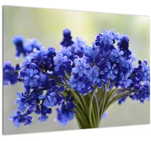 Skleněný obraz kytice modrých květů (70x50 cm)
