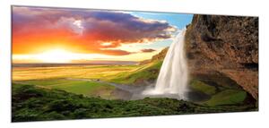 Obraz skleněný vodopád v horách a západ slunce - 60 x 90 cm