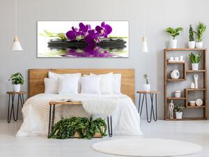 Obraz skleněný temný květ orchideje na kameni a hladině - 30 x 60 cm