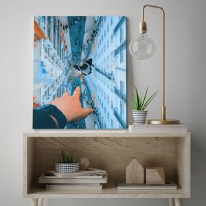 Obraz na plátně Budovy City Hand Butterfly - Bryantama Art Rozměry: 40 x 60 cm