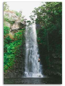 Obraz na plátně Muž skákající z vodopádu Rozměry: 40 x 60 cm