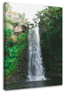 Obraz na plátně Muž skákající z vodopádu Rozměry: 40 x 60 cm