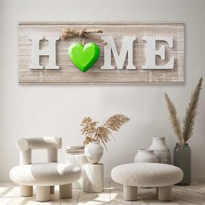 Obraz na plátně Nápis Home se zeleným srdcem na světlém dřevě Rozměry: 90 x 30 cm