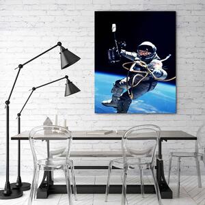 Obraz na plátně Astronaut nad zemí - Nikita Abakumov Rozměry: 40 x 60 cm