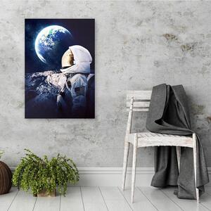 Obraz na plátně Astronaut se dívá na Zemi z vesmíru - Gab Fernando Rozměry: 40 x 60 cm