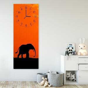 Hodiny na zeď Putování slona Rozměry: 25 x 65 cm