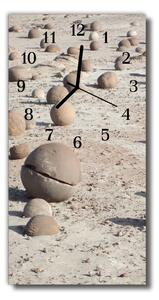 Skleněné hodiny vertikální Zobrazit kameny na béžové pláži 30x60 cm