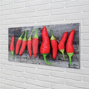 Obraz na skle červené papriky 100x50 cm