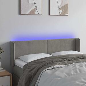 Čelo postele s LED světle šedé 147 x 16 x 78/88 cm samet 3123004