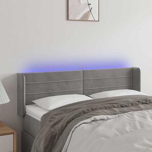 Čelo postele s LED světle šedé 147 x 16 x 78/88 cm samet 3123424