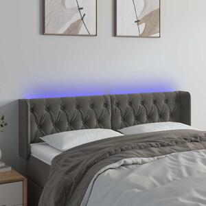 Čelo postele s LED tmavě šedé 147 x 16 x 78/88 cm samet 3123621