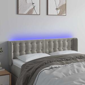 Čelo postele s LED světle šedé 147 x 16 x 78/88 cm samet 3123718