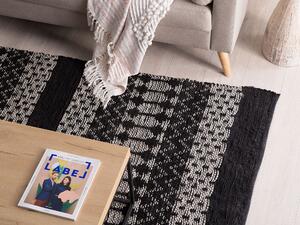 Kožený koberec 140 x 200 cm černý/béžový SOKUN