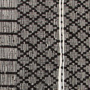 Kožený koberec 140 x 200 cm černý s béžovým FEHIMLI