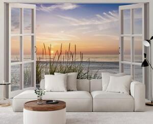 Fototapeta, Pohled z okna na západ slunce na pláži - 140x100 cm