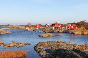 Fotografie Small cottages in autumn i archipelago, Anders Sellin