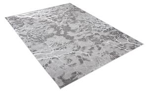 Jednoduchý moderní koberec v šedé barvě s bílým motivem