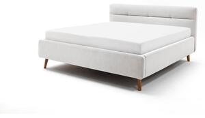 Světle šedá čalouněná dvoulůžková postel s úložným prostorem s roštem 180x200 cm Lotte – Meise Möbel