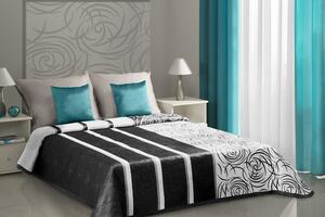 Černo-bílý oboustranný přehoz na postel s černými ornamenty a pruhy