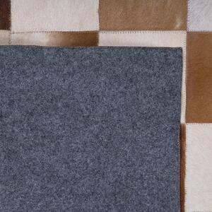 Kožený koberec hnědý s béžovou 140 x 200 cm SOLMAZ