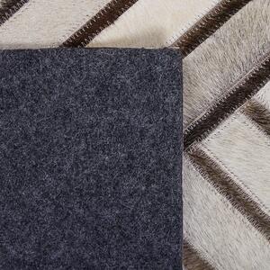 Béžový kožený koberec 140 x 200 cm TEKIR