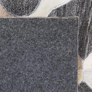Kožený koberec v šedé a béžové barvě 140 x 200 cm ROLUNAY