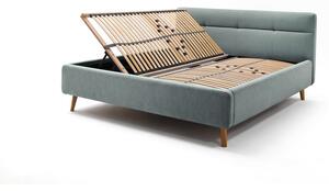 Modrá čalouněná dvoulůžková postel s úložným prostorem a s roštem 160x200 cm Lotte – Meise Möbel