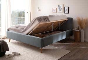 Modrošedá čalouněná dvoulůžková postel s úložným prostorem s roštem 160x200 cm Mattis – Meise Möbel