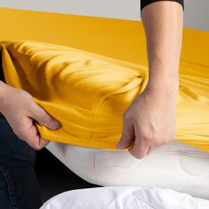 Bavlněné jersey prostěradlo s gumou DecoKing Amber žluté