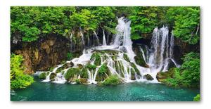 Foto obraz skleněný horizontální Vodopád v horách osh-85137892