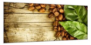 Obraz skleněný kávové zrna a list na dřevě - 34 x 72 cm