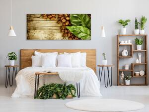 Obraz skleněný kávové zrna a list na dřevě - 30 x 60 cm