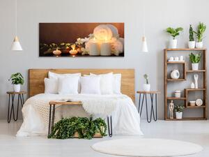 Obraz skleněný spa bílé svíce, květy a ručník - 30 x 60 cm