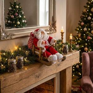 Vánoční dekorace Santa Claus na saních