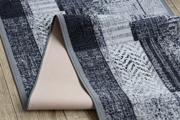 Associated Weavers Běhoun pogumovaný Essenza 19 šedý Šíře: 67 cm