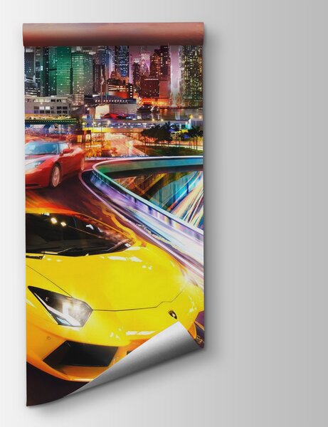 Fototapeta Žlutá a červená sportovní auta na silnici s městem v pozadí, Designové fototapety na zeď, Populární fototapety, u64341 - Tapeko.co.cz