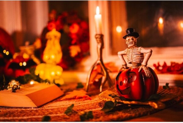 Retlux- LED Dekorace HALLOWEEN LED/2xLR44/teplá bílá kostlivec v dýni pryskyřice
