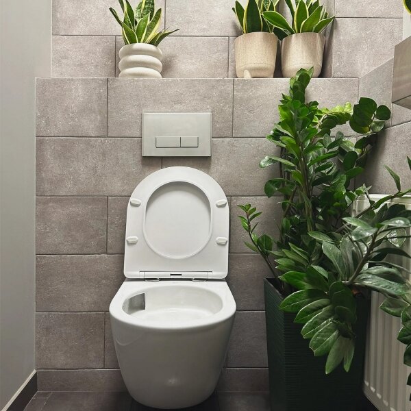 REA-C1259 - Závěsné WC s prkénkem CARLO MINI TORNADO RIMLESS keramika/lesk. bílá