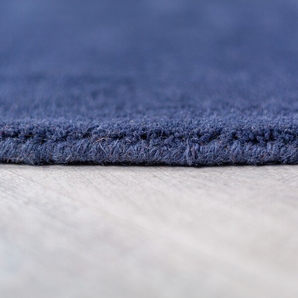 Modrý ručně tkaný vlněný kulatý koberec ø 150 cm Mia Segment – Flair Rugs