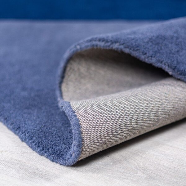 Modrý ručně tkaný vlněný kulatý koberec ø 150 cm Mia Segment – Flair Rugs