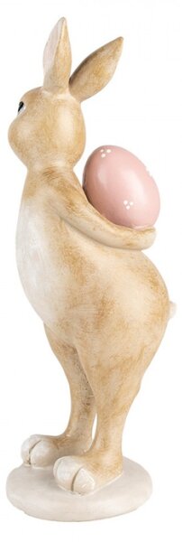 Velikonoční figurka hnědý zajíček schovává růžové vajíčko za zády Vrollenberg – 10x12x31 cm