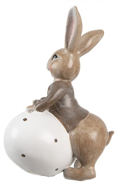 Velikonoční figurka hnědý zajíček se opírá o bílá zdobené vajíčko Brulstijn – 17 cm