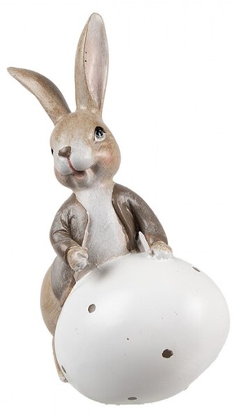 Velikonoční figurka hnědý zajíček se opírá o bílá zdobené vajíčko Brulstijn – 17 cm