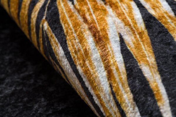 Makro Abra Kusový koberec pratelný MIRO 51518.805 Listí pogumovaný černý zlatý Rozměr: 160x220 cm