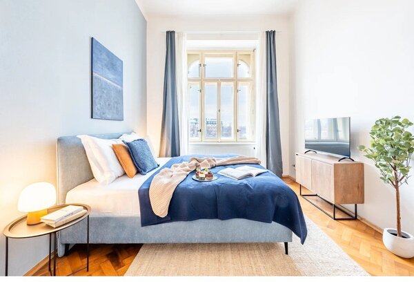 Modrá čalouněná dvoulůžková postel s roštem 180x200 cm Noira Slim – Bonami Selection