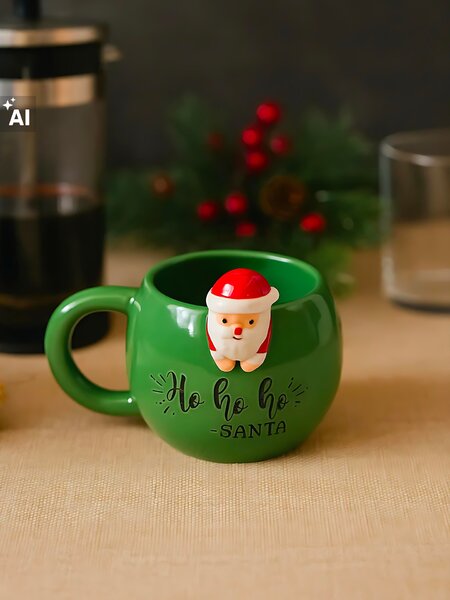 Sinsay - Vánoční keramický hrnek s figurkou Santy a nápisem - zelená