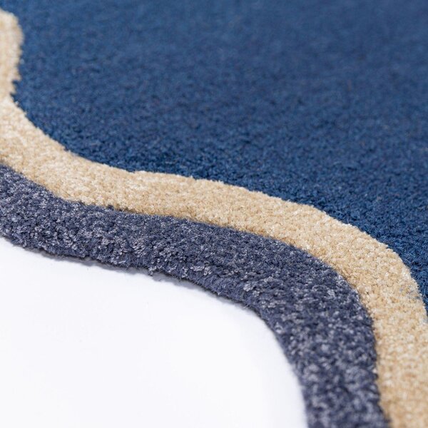 Tmavě modrý ručně tkaný koberec s příměsí vlny 120x170 cm Rivo Wool – Flair Rugs
