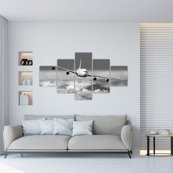 Obraz - Letadlo v oblacích, černobílé (125x70 cm)