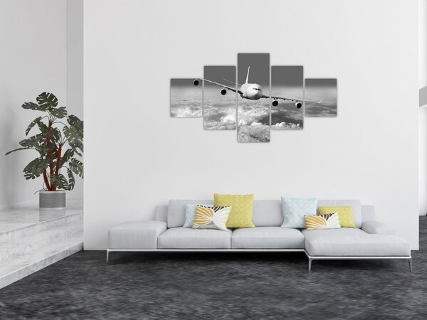 Obraz - Letadlo v oblacích, černobílé (125x70 cm)